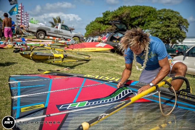 The Action Man, Brian Talma, getting his NoveNove stickers on before his Pro Trials heat - 2015 Novenove Maui Aloha Classic © American Windsurfing Tour / Sicrowther